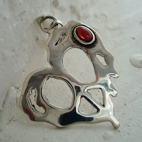 Peace Heart in sterling silver with a garnet